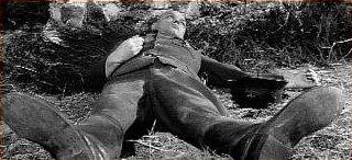 Richard Burton (not in the frame) points to dead  German soldier and comments on irony of war, from The Longest Day